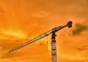 Crane at orang sky