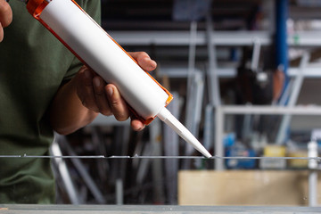 Silicone adhesive for general and industrial applications