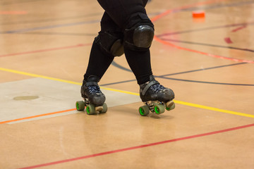 Fototapeta premium Roller derby players compete against each other