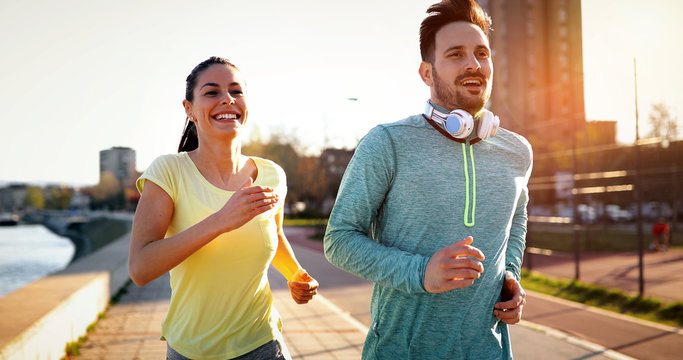 Friends fitness training together outdoors living active healthy