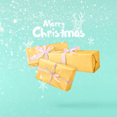 Christmas concept.  Creative Christmas conception made by falling in air silver gift box