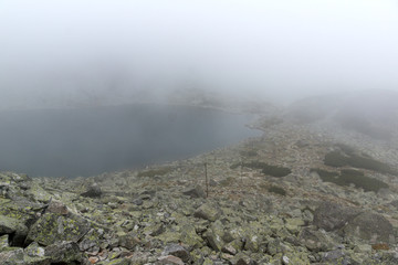 Amazing Landscape with fog over Musalenski lakes,  Rila mountain, Bulgaria