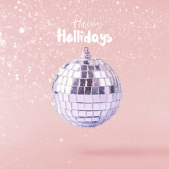 Christmas concept.  Creative Christmas conception made by falling in air shiny disco ball