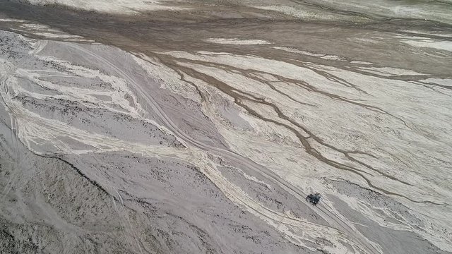 Aerial view above road in valley with a off road jeep in Tarlac, Philippines.