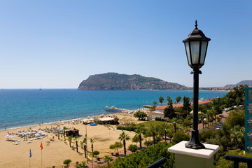 Lantern on the background of the beach of the coast of Alanya.