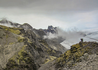 Skaftafellsjokull Glacier: glacier tongue with ice and snow slide down the mountain valley in Skaftafell, South Iceland, Europe