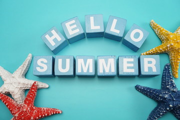 Hello Summer alphabet letter and marine decoration on Blue background