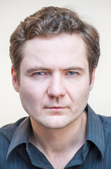 Fototapeta premium Mistrustfully looking man portrait