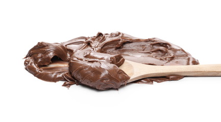 Chocolate cream with wooden spoon isolated on white background