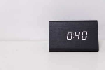 Black digital clock on a white background showing time 0:40