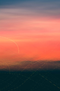 Multicolored sky background with light trails
