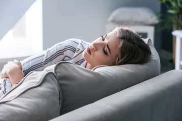 Lonely woman suffering from depression at home