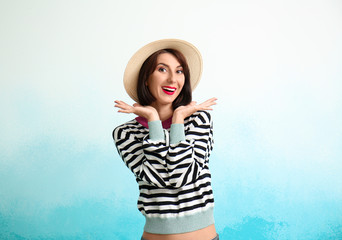 Portrait of beautiful woman on color background