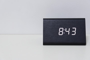 Black digital clock on a white background showing time 8:43