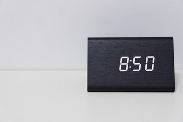 Black digital clock on a white background showing time 8:50