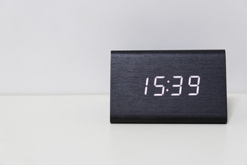 Black digital clock on a white background showing time 15:39
