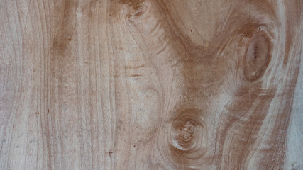 Brown plywood made in the background.