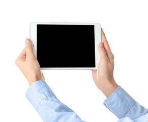 Young woman holding tablet PC on white background