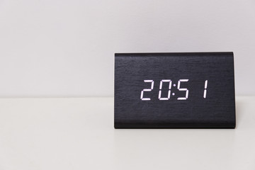 digital table clock showing 20:51 time