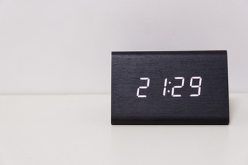 digital table clock showing 21:29 time