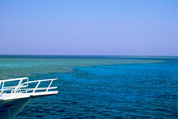 Fototapeta na wymiar Beautiful view at azure Red Sea with a white yacht