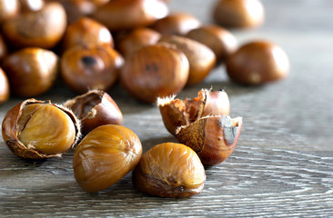 The Chestnut roasted and put on the wooden background