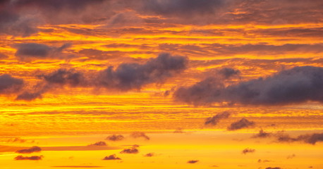 Bright orange wake sky at sunset