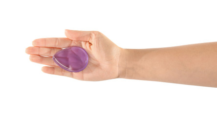 Woman holding silicone sponge on white background