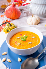 healthy pumpkin soup with ginger carrots and coconut milk