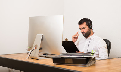 Telemarketer man in a office