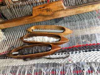closeup of a manual carpet loom