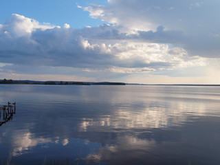Clouds over the river. Russian summer nature. Russia, Ural, Perm region