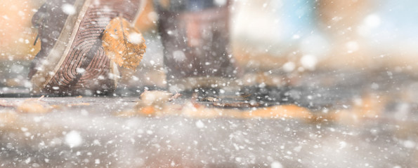 Winter park a man walks along a path foliage