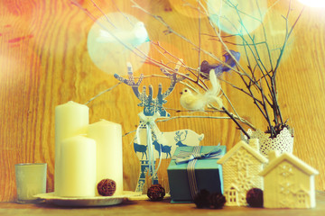 composition with candles branches toys