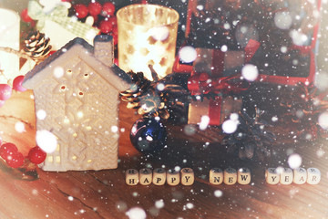 new year snow table with pine cone and candle