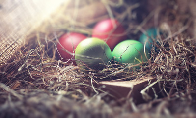 Easter painted eggs on burlap