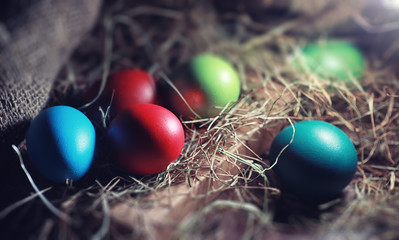 Easter painted eggs on burlap