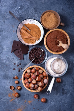 Baking ingredients for a cake with chocolate chips and hazelnuts, baking concept