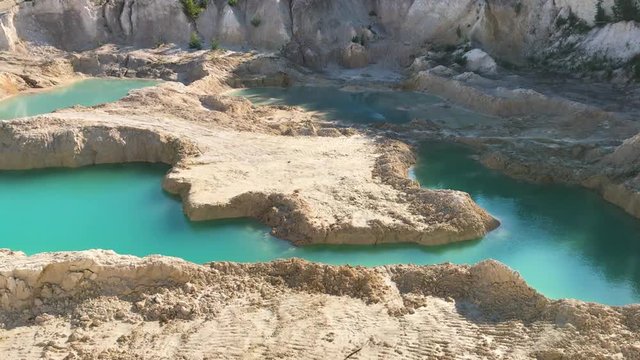 Beautiful kaolin quarry with turquoise water. Kaolin mining. Kyshtym, Russia