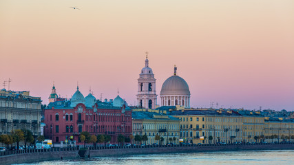 Fototapeta premium Birzhevoy Bridge with Tserkov' svyatoy velikomuchenitsy Ekateriny, The Church of Saint Catherine, St Petersburg, Saint Petersburg, Russia.