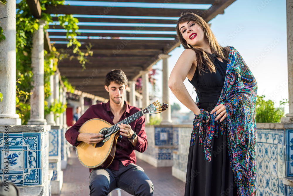 Wall mural Band performing traditional music fado under pergola with azulejos in Lisbon, Portugal