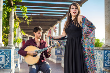Band performing traditional music fado under pergola with azulejos in Lisbon, Portugal