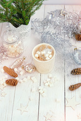  Christmas holiday background. vintage glass toys, cocoa cup, marshmallows, cones, decor, fir branches on rustic wooden table. cozy still life. festive winter season template for design. top view