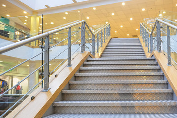 stairs of the shopping center. in a modern shopping complex