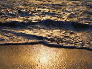 close up waves and sand