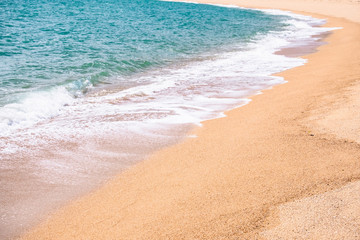 Background, Wave foam and blue ocean on the beach.