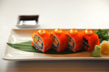 California rollsl sushi with egg cucumber avocado cream cheese red caviar Sushi menu. Japanese food. American style