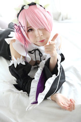Portrait of Japan anime cosplay woman , white japanese maid in white tone room