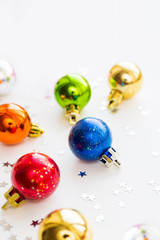 Christmas and New Year background with colorful decorative balls for Christmas tree. Place for text.