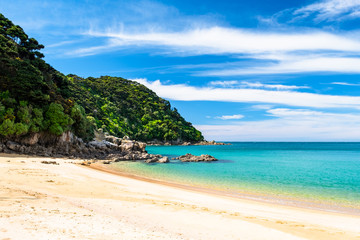 A beautiful beach along the coastline in Abel Tasman National Park, South Island, New Zealand.